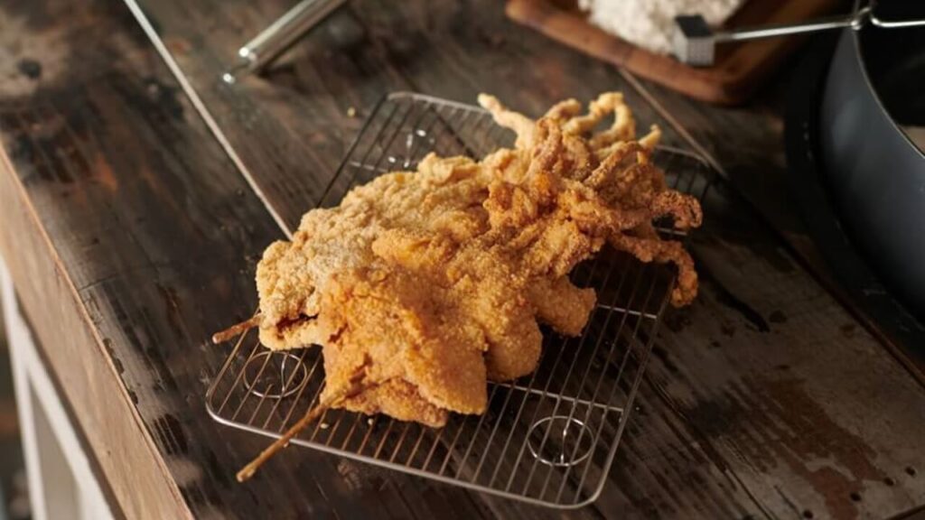 Enjoy the Sotong Raja by Alis Fried Chicken - king-sized crispy squid with tasty marination.